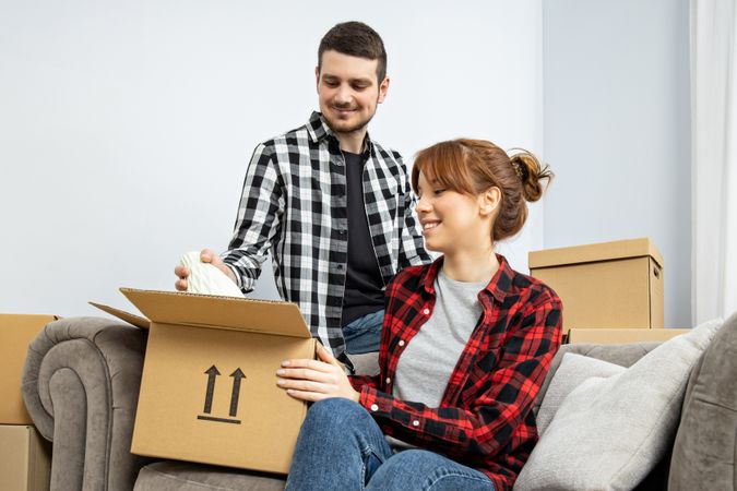 Concept of move with a happy young couple