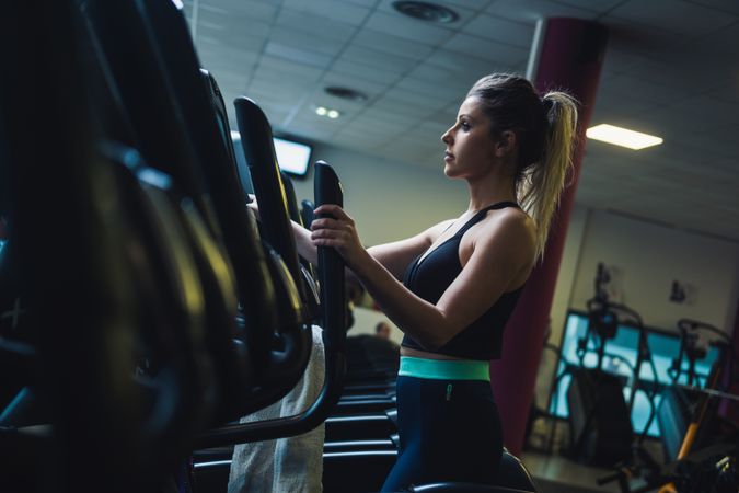 woman on exercise machine