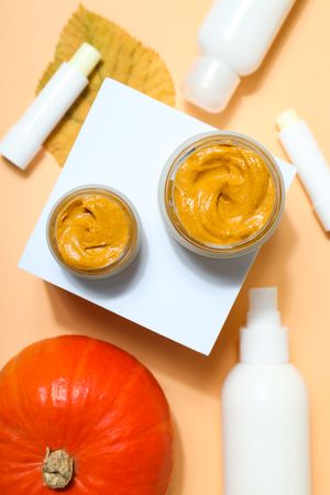 Concept of different cosmetic products, Pumpkin cosmetics, top view