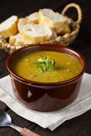 Pea soup. Bowl with pea soup on the table
