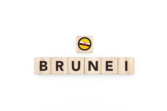 Wooden blocks bearing the name and flag of Brunei.