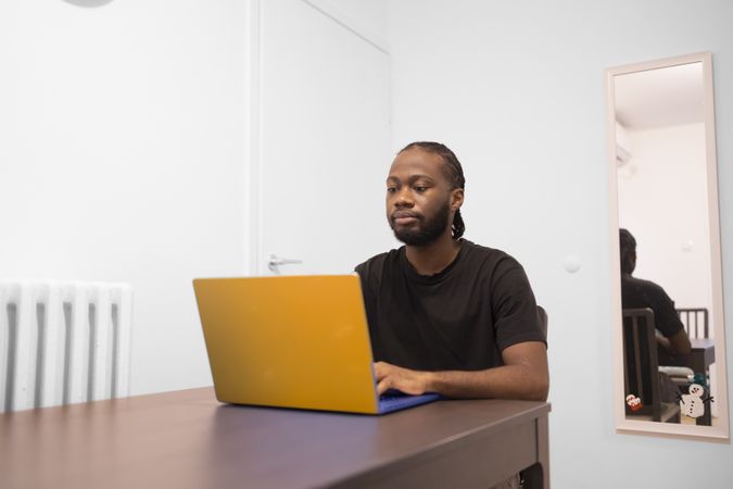 Focused Remote Work in Minimalist Home Office.