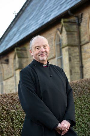 Vicar outside parish