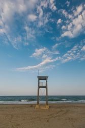 Observation tower at empty seashore