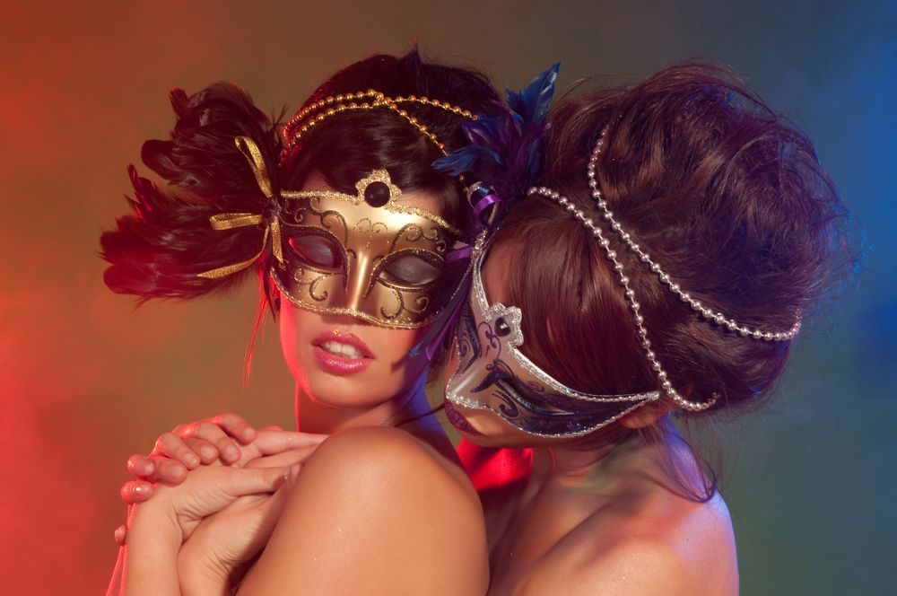 Charming women in masks