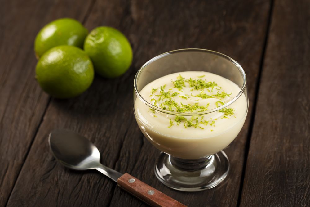 Lemon mousse with lemon zest on top.