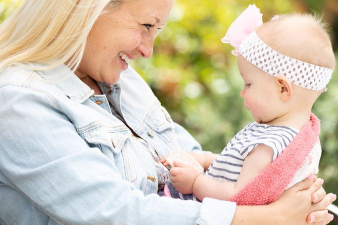 Young Mother and Daughter At The Park
