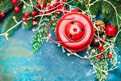 Top view of ornamental Christmas lantern on green table