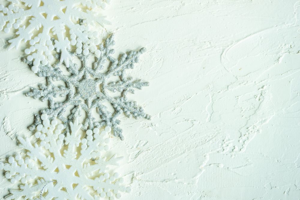 Bright Christmas lay out with snowflake ornament