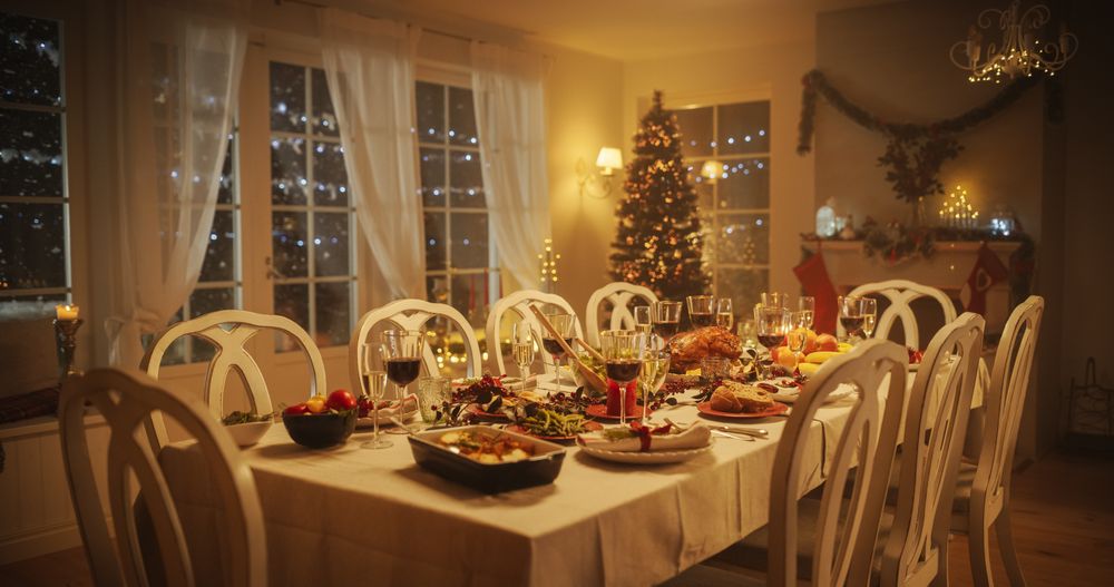 Tasty Meals and Festive Decorations Prepared for a Family Dinner at Home to Celebrate Thanksgiving Day or Christmas.
