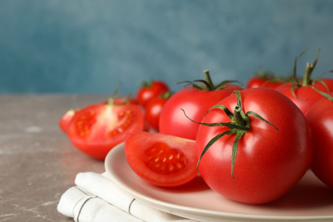 Fresh red tomatoes, close up. Ripe vegetable