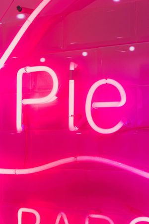 Pie text with neon light signage