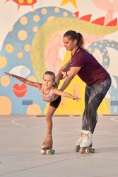 Active instructor training child to roller skating