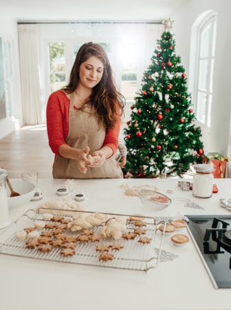Woman preparing cookies for Christmas