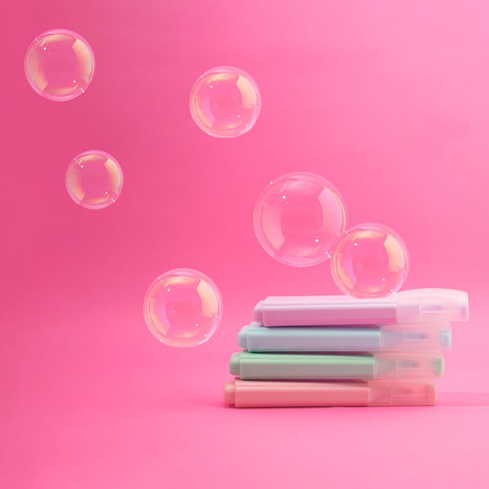 School markers in pastel colors with transparent balloons