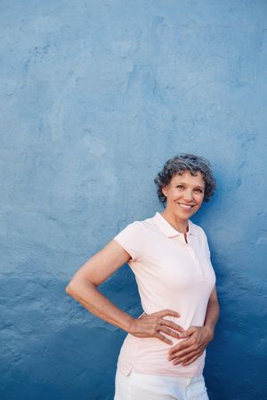 Portrait of attractive mature woman posing to camera