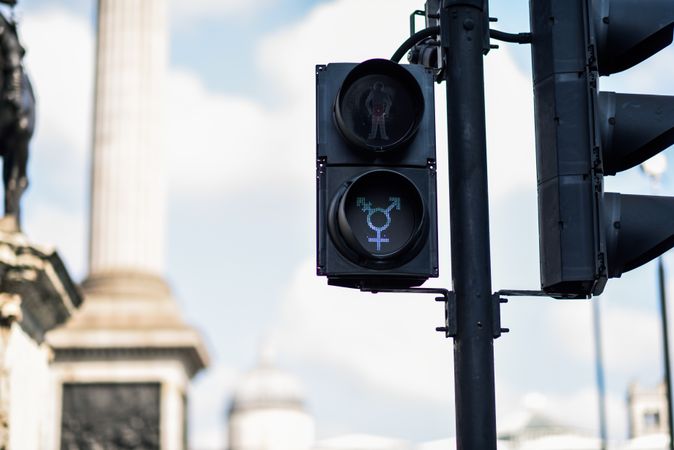 "Go" green pedestrian lights with  transgender symbol