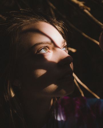 Shadow falling on woman's face