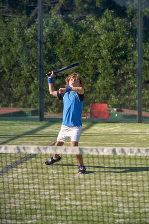 Boy getting ready to hit ball on playground