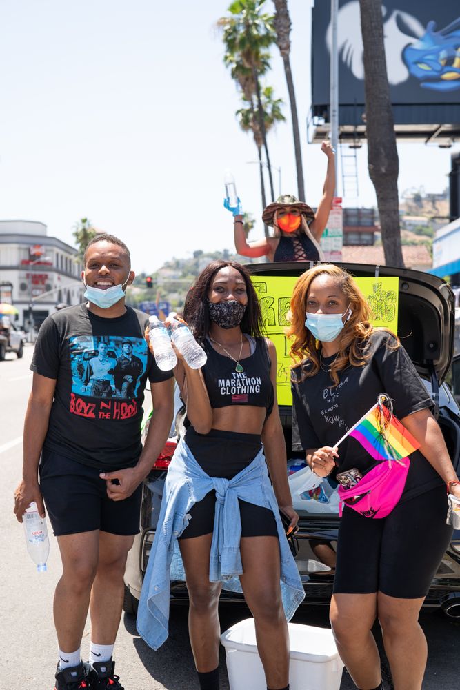 Los Angeles, CA, USA — June 14th, 2020: people handing out water and snacks at racial justice march