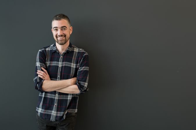 Smiling man posing in casual clothes