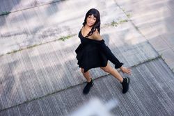 Female dancer performing looking up
