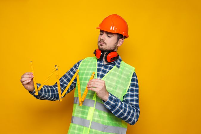 Young man civil engineer in safety hat