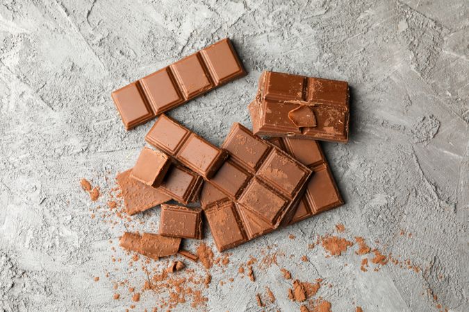 Tasty chocolate on gray background. Sweet food