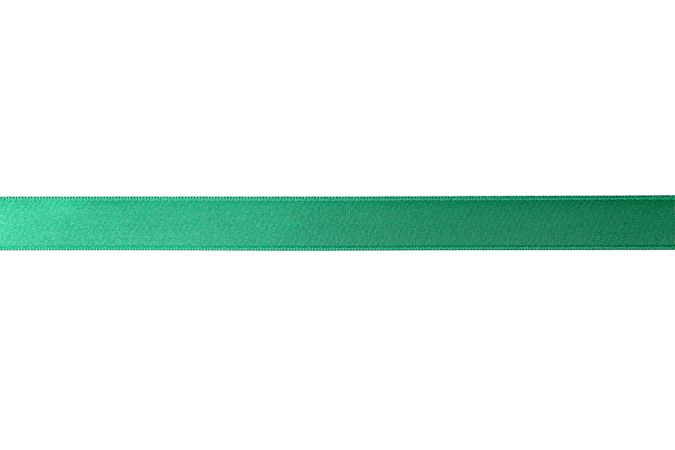 Green ribbon isolated on plain background. Gift concept