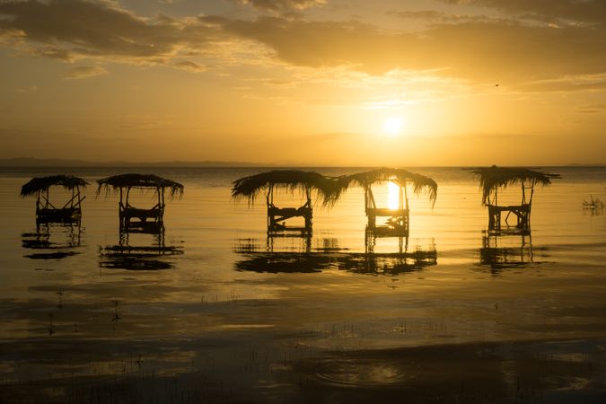 Laundry in sea at sunset