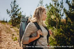 Woman exploring nature while hiking 0LdPDe