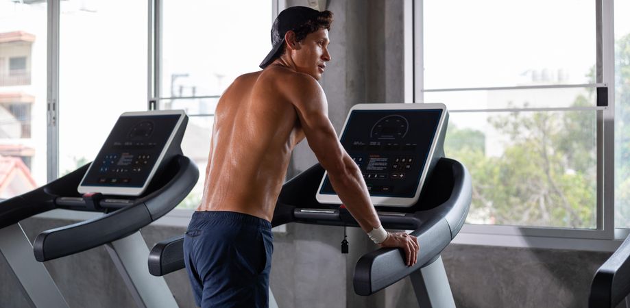 Rear view of male on treadmill