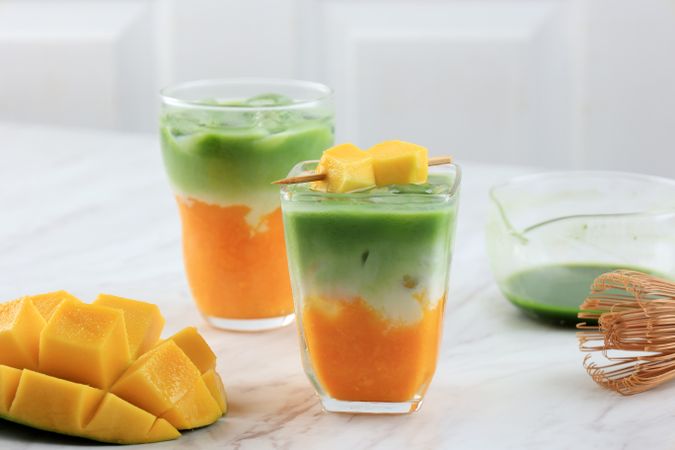 Homemade Iced Mango Matcha Latte on Table