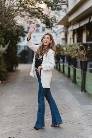 Charming woman posing on street