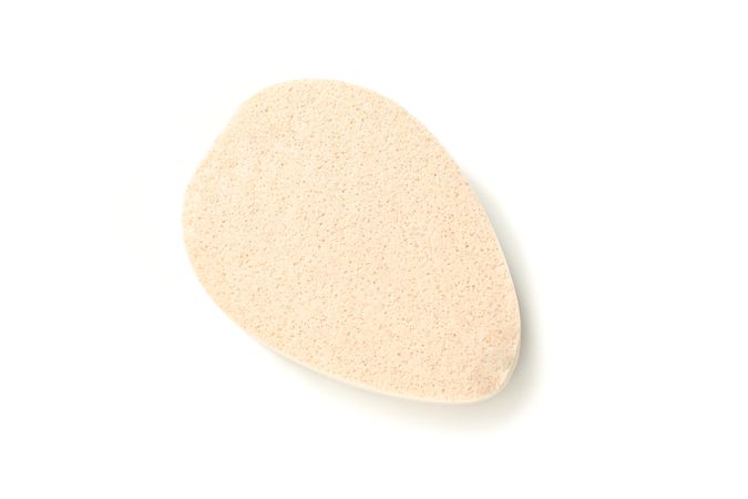 Light bath sponge isolated on blank background