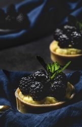 Homemade small cake with blackberries
