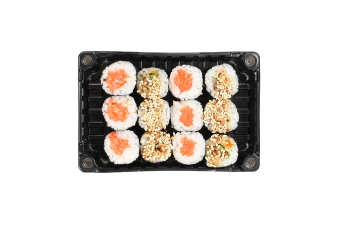 Box with sushi isolated on light background