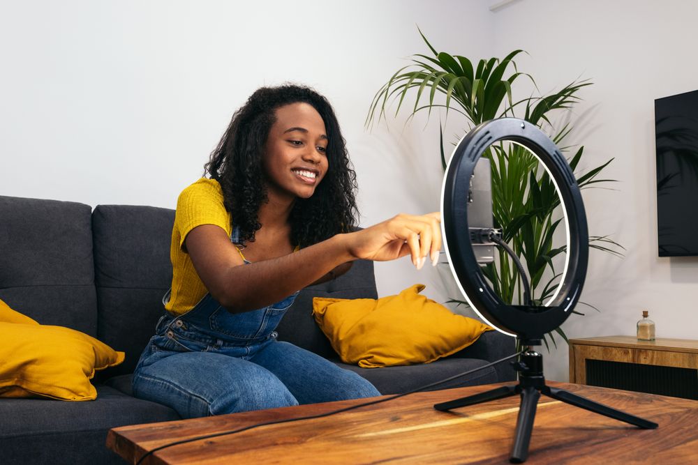Young woman creates content with phone