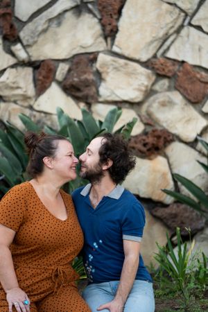 Side view portrait of romantic partners about to kiss