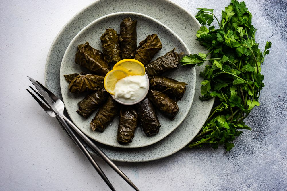 Top view of grey plate with traditional Georgian dolma dish
