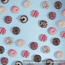 Donuts or cookies on blue background 4mndNb