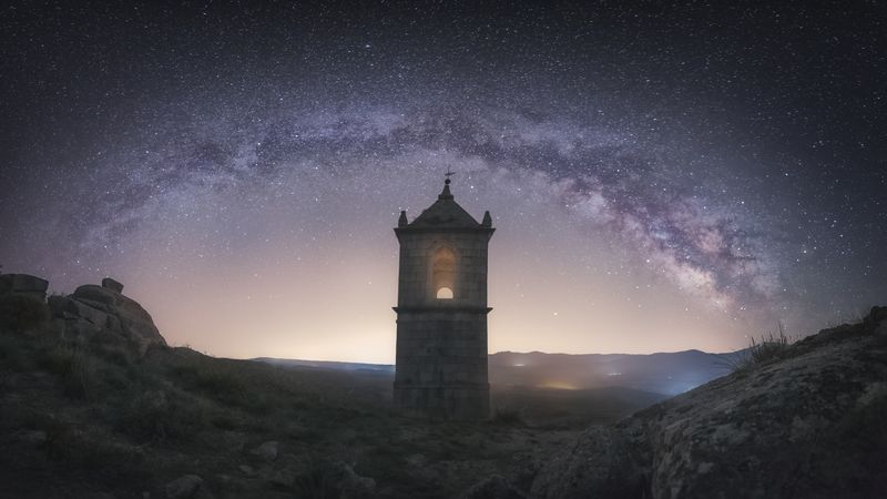Ancient building under night starry sky