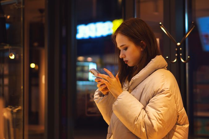 Woman enjoying nightlife in city