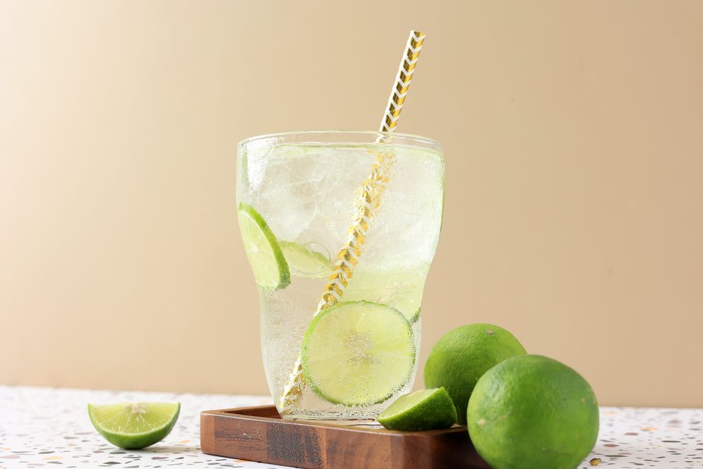 A Glass of Iced Lime Soda with Sliced Lime
