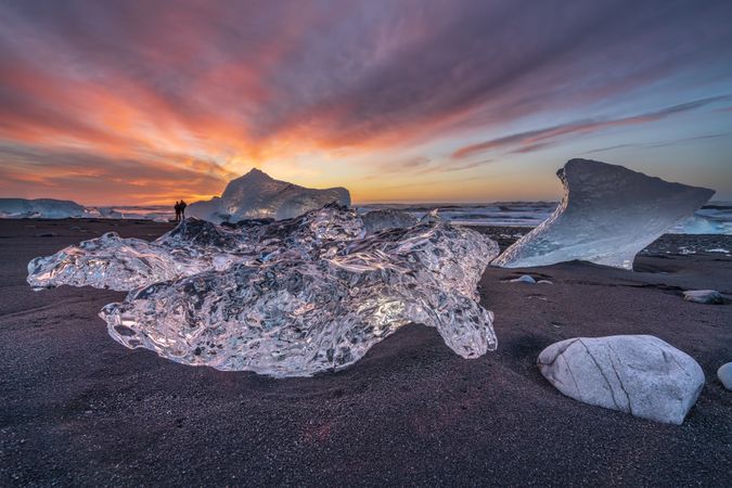 Ice glacier on sand during sunset in Iceland