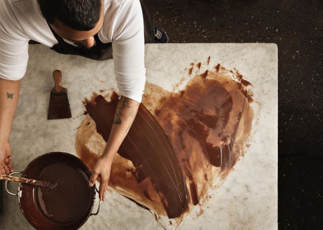 Top view of heart shape made of melted chocolate