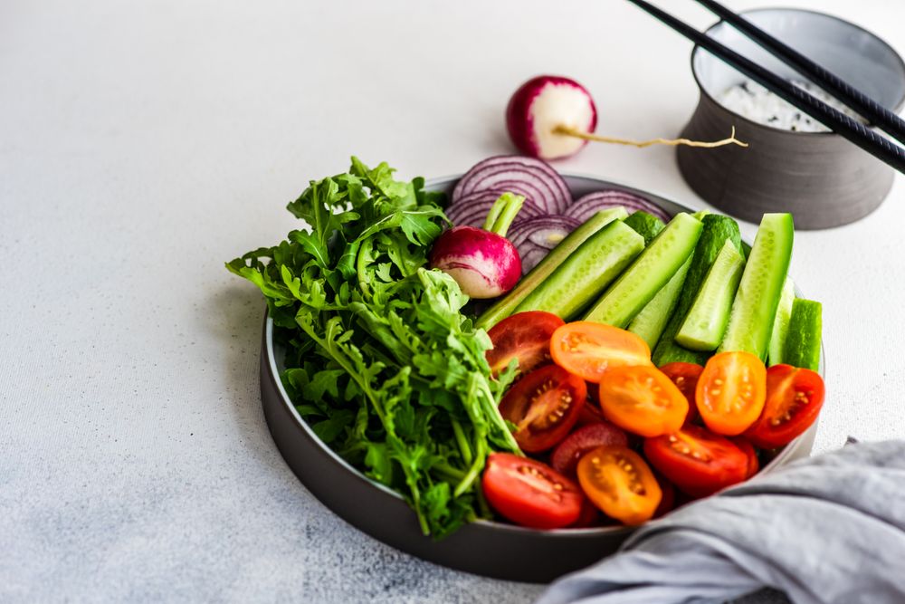 Healthy chopped vegetables with copy space