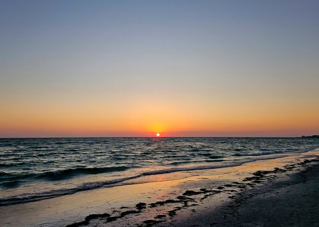 Golden sunset over tranquil waters