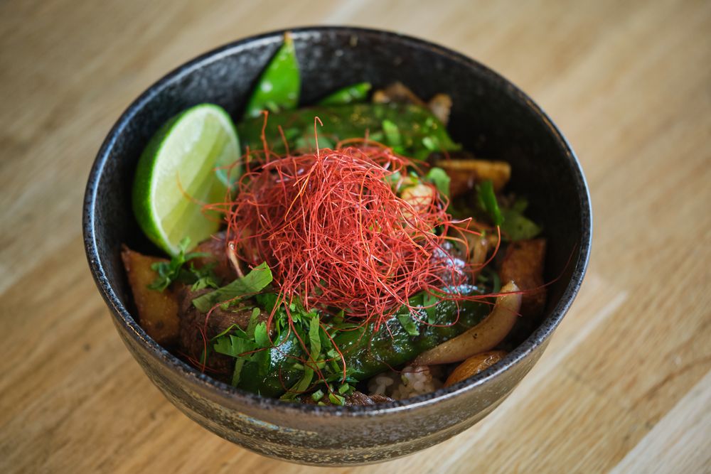 Asian dish with herbs in bowl