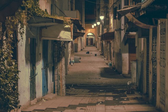 Old narrow street of town at night